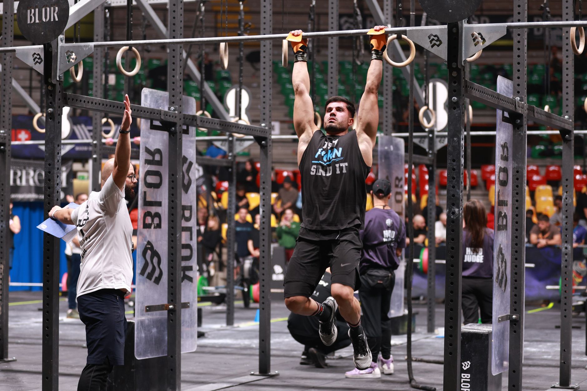 Athlete strength training in a gym for Best app for injury pause and muscle-avoidance planning.