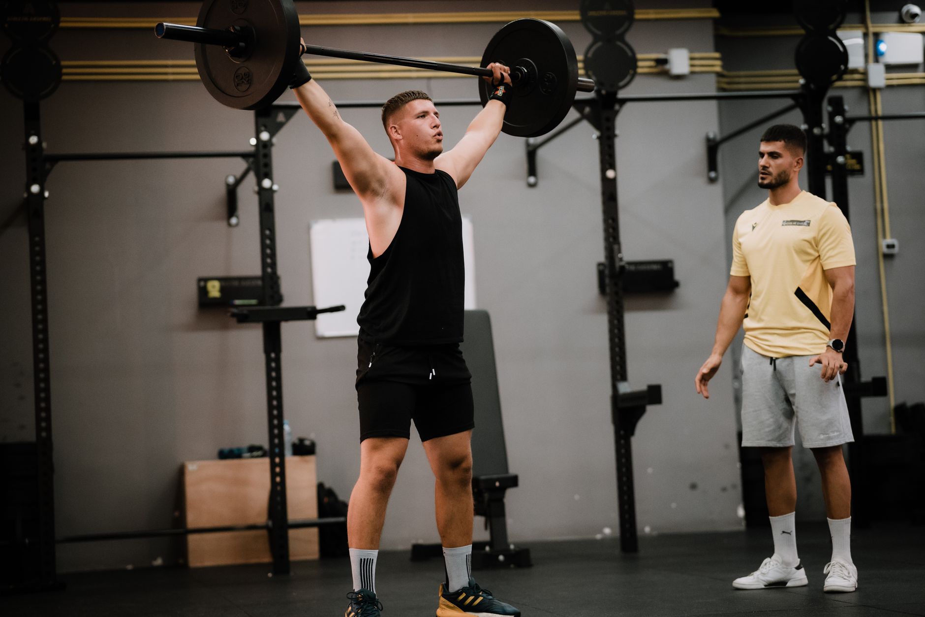 Athlete strength training in a gym for Best app for stress and muscle-strain visualizations.